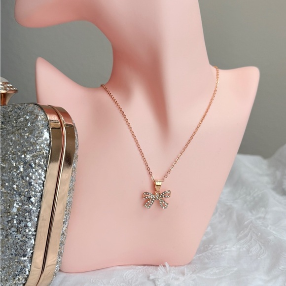 Elegant Gold Bow Pendant Necklace - Picture 3 of 4
